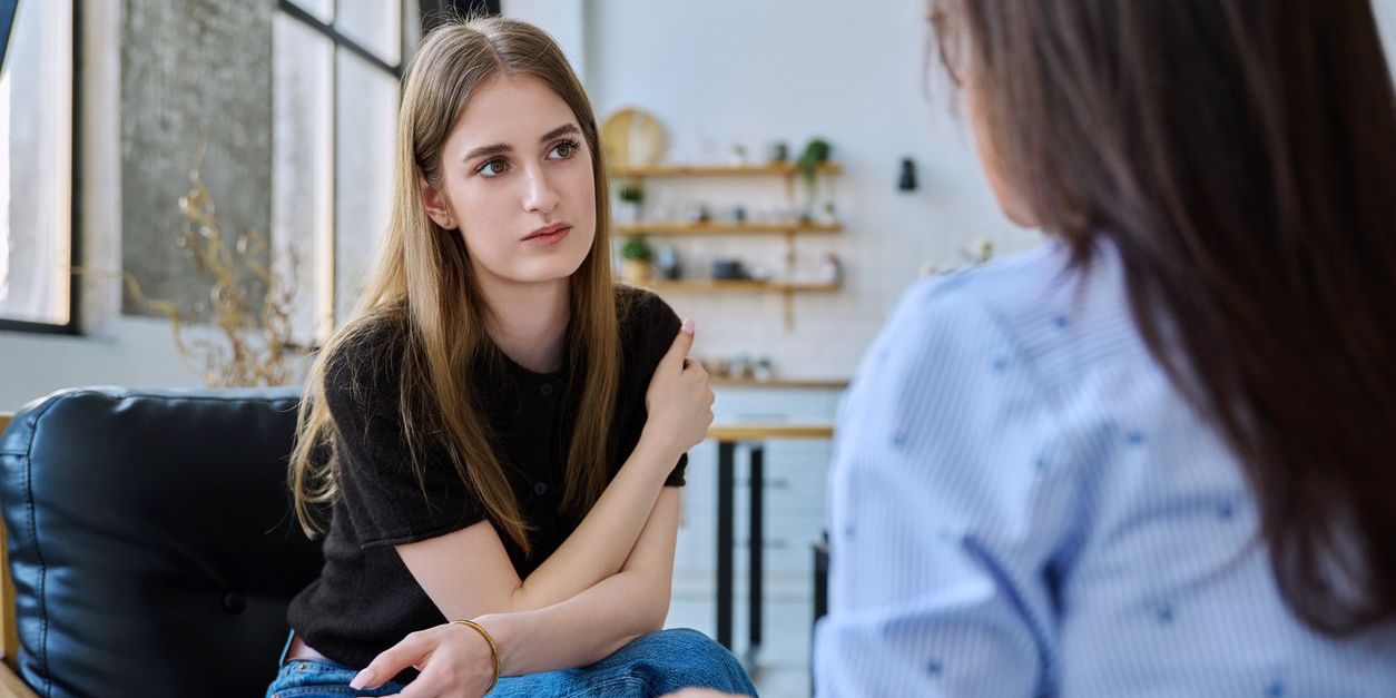 woman being supported in early recovery through therapy