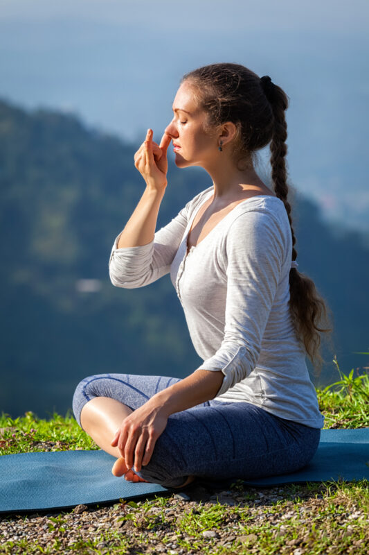 breathwork for mental health woman overlooking ocean