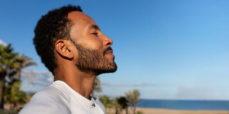 man doing breathing exercises in addiction treatment