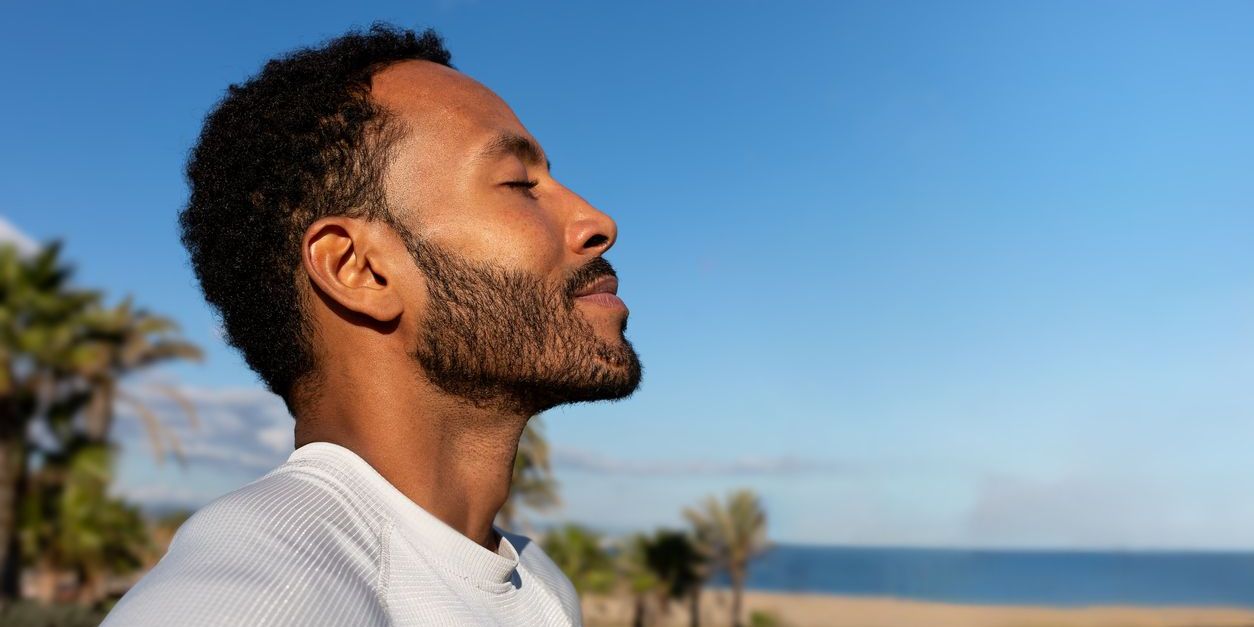 man doing breathing exercises in addiction treatment