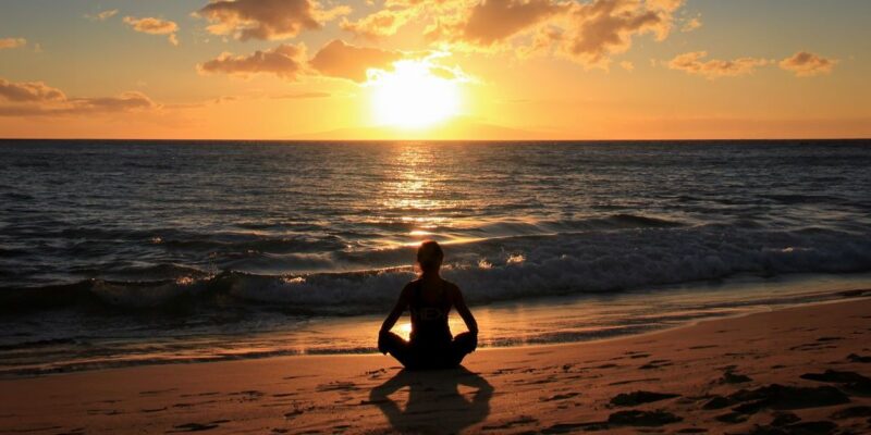 person doing mindfulness practice at sunset