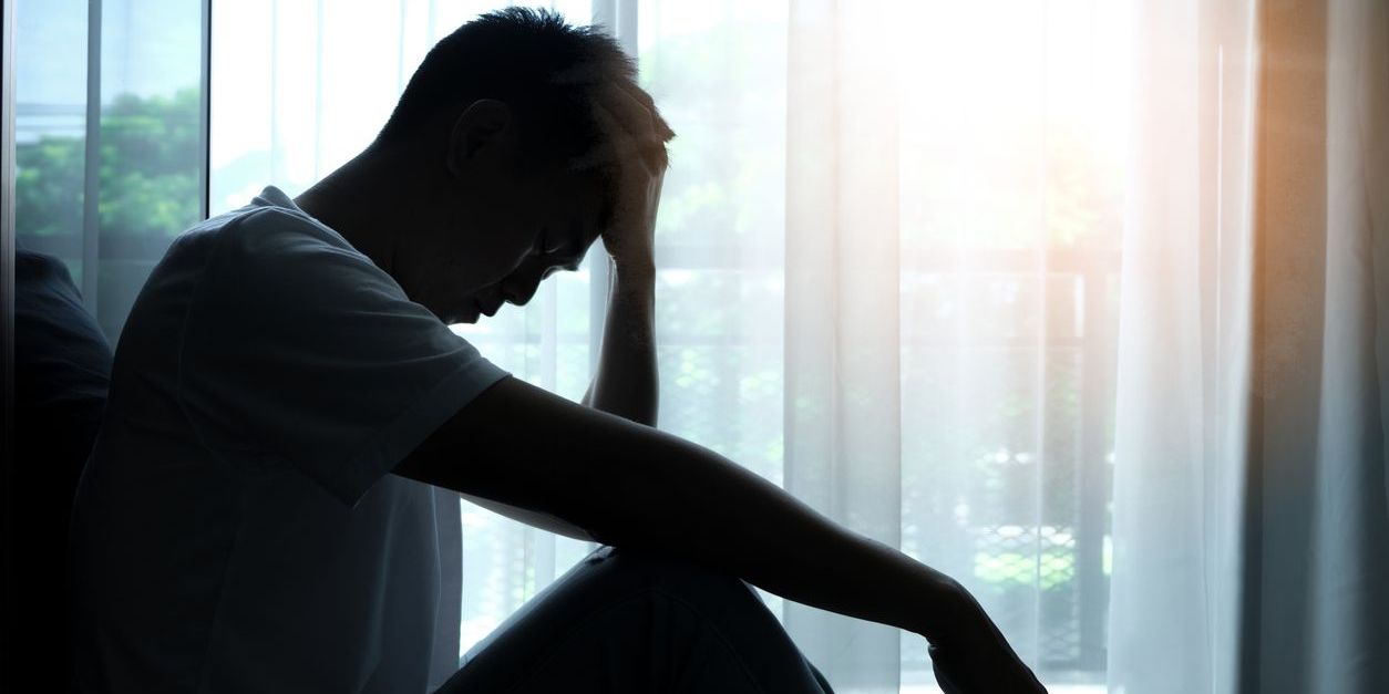 man experiencing anxiety which can lead to addiction